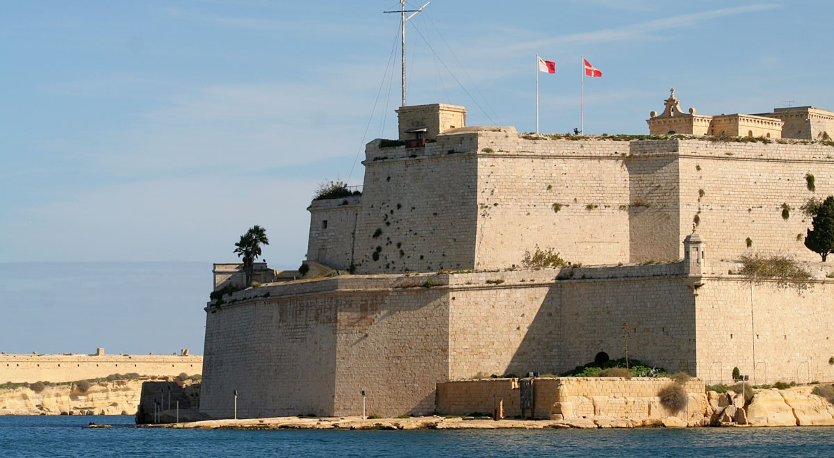 After two centuries, the Order of Malta flag flies over fort St. Angelo, beside the Maltese flag