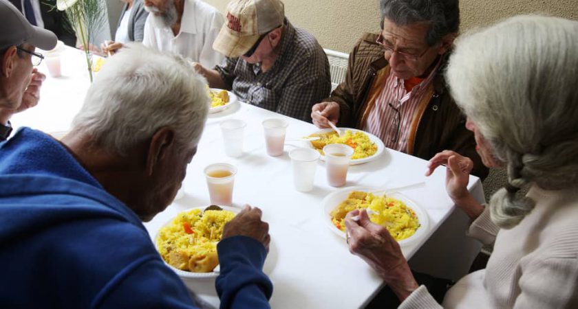 The Venezuelan Association offers hot meals and medical examinations to the elderly in a district of Caracas