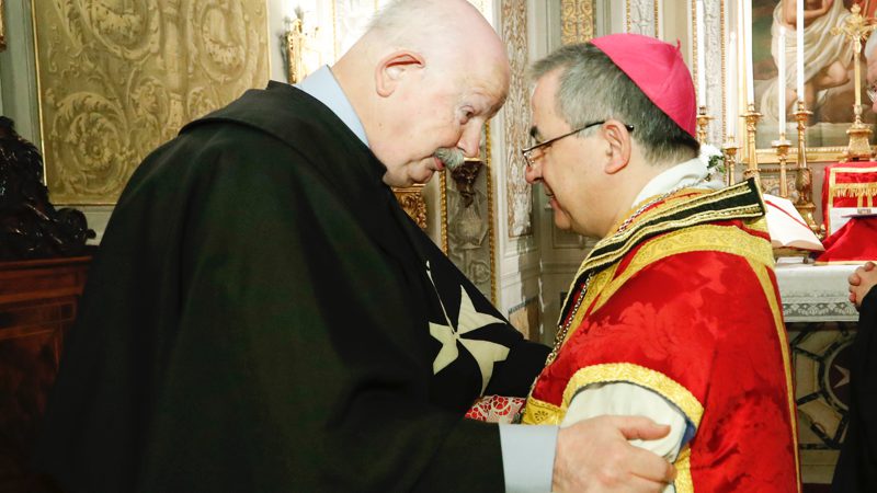 Archbishop Becciu is received into the Order