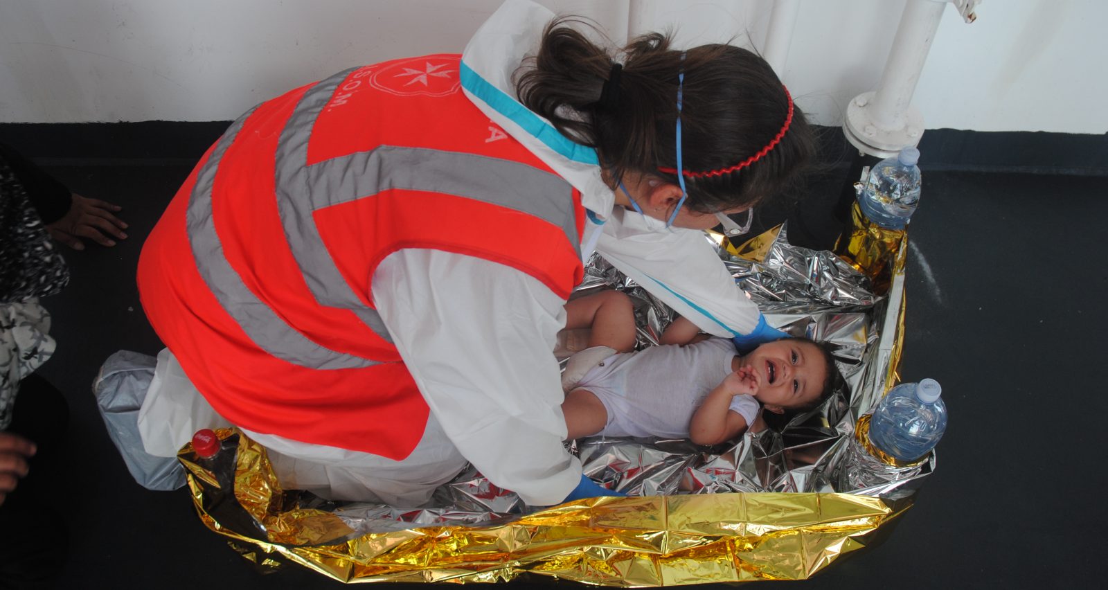 CISOM staff member rescues a child